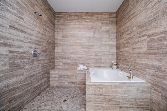 1284 Madison Unit 2149, Huntsville, AR 72740 - bathroom with a bath, a tile shower, and tile walls