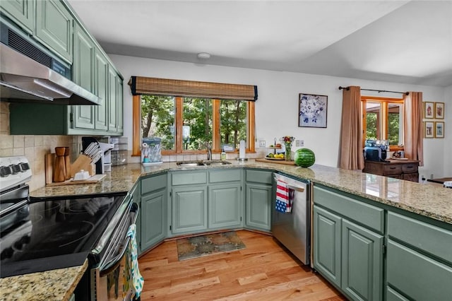 16048 Cypress Ln, Rogers, AR 72756 - kitchen featuring appliances with stainless steel finishes, green cabinetry, under cabinet range hood, light wood-style floors, and light stone countertops