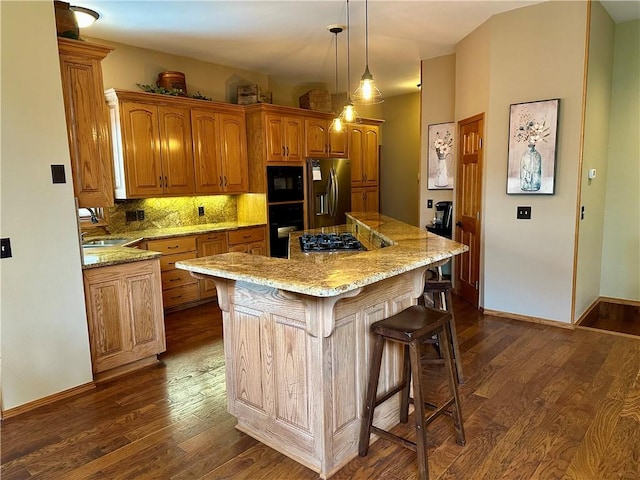9364 Everest Pl, Rogers, AR 72756 - kitchen with stainless steel fridge with ice dispenser, dark wood-style flooring, a kitchen bar, and a center island