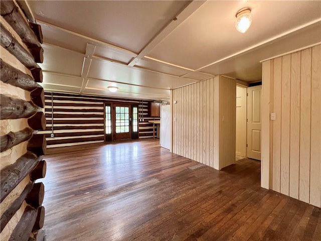 440 N Duff Ave, Sulphur Springs, AR 72768 - unfurnished living room featuring wood-type flooring, coffered ceiling, and wood walls