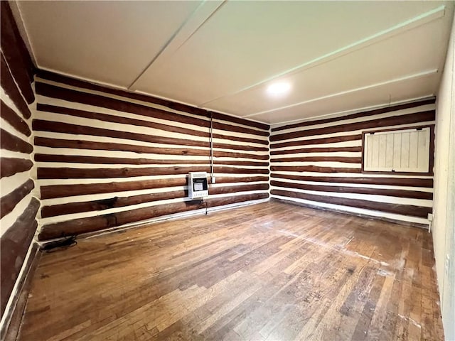 440 N Duff Ave, Sulphur Springs, AR 72768 - spare room with heating unit, hardwood / wood-style flooring, and recessed lighting
