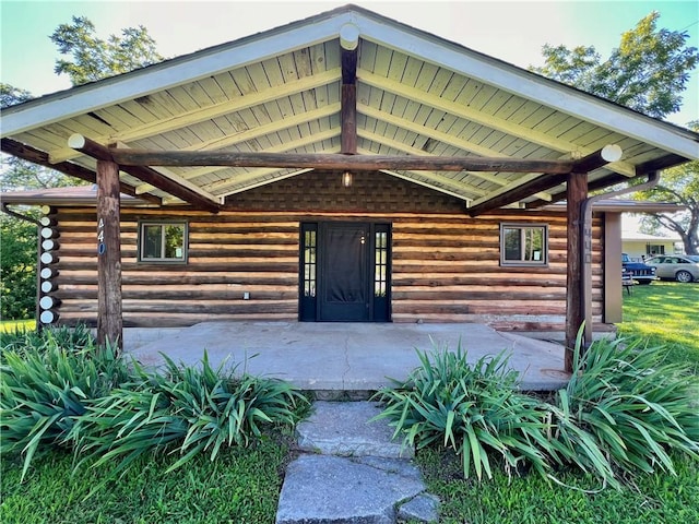 440 N Duff Ave, Sulphur Springs, AR 72768 - doorway to property featuring log siding