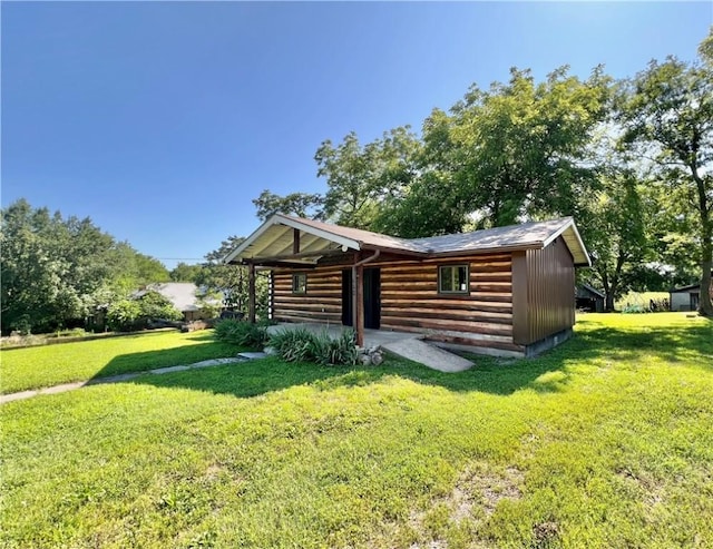 440 N Duff Ave, Sulphur Springs, AR 72768 - back of property featuring a lawn