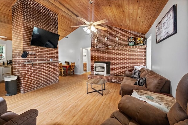63155 S 4700, Watts, OK 74964 - living room with a ceiling fan, heating unit, lofted ceiling, wooden ceiling, and a fireplace