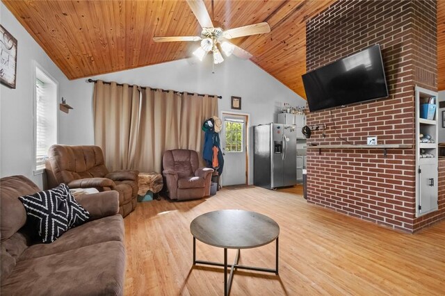 63155 S 4700, Watts, OK 74964 - living area featuring wood finished floors, vaulted ceiling, a ceiling fan, and wood ceiling