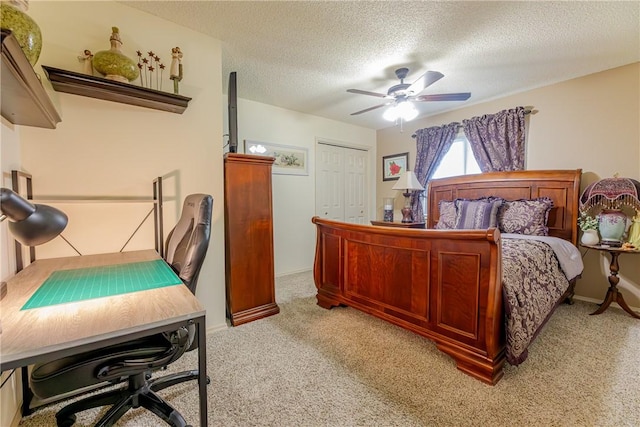 2 Kildonan Ln, Bella Vista, AR 72715 - bedroom with a closet, light carpet, an office area, a textured ceiling, and ceiling fan