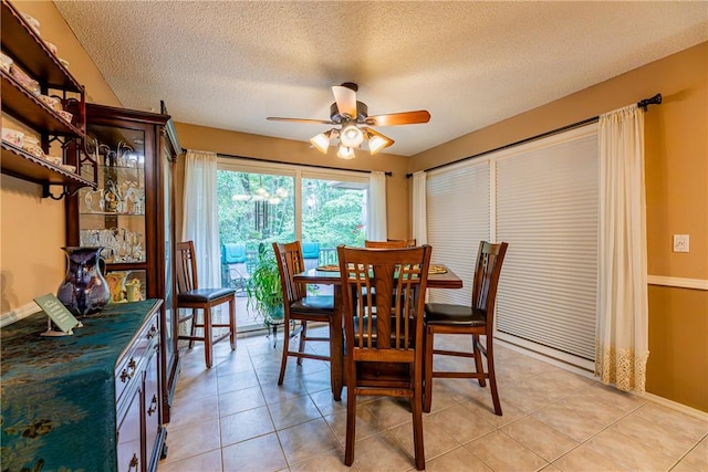 2 Kildonan Ln, Bella Vista, AR 72715 - dining area with ceiling fan, a textured ceiling, and light tile patterned floors