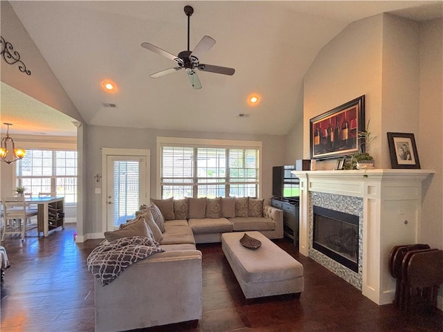 1610 Sweetbriar, Centerton, AR 72719 - living room featuring a fireplace, dark wood-type flooring, ceiling fan, recessed lighting, and a chandelier