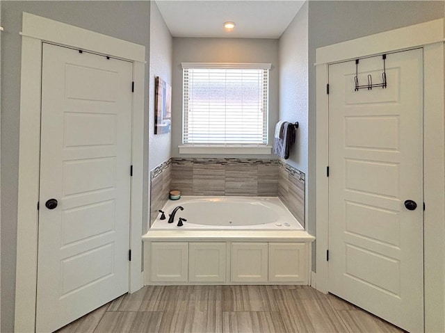 1610 Sweetbriar, Centerton, AR 72719 - bathroom with a tub with jets