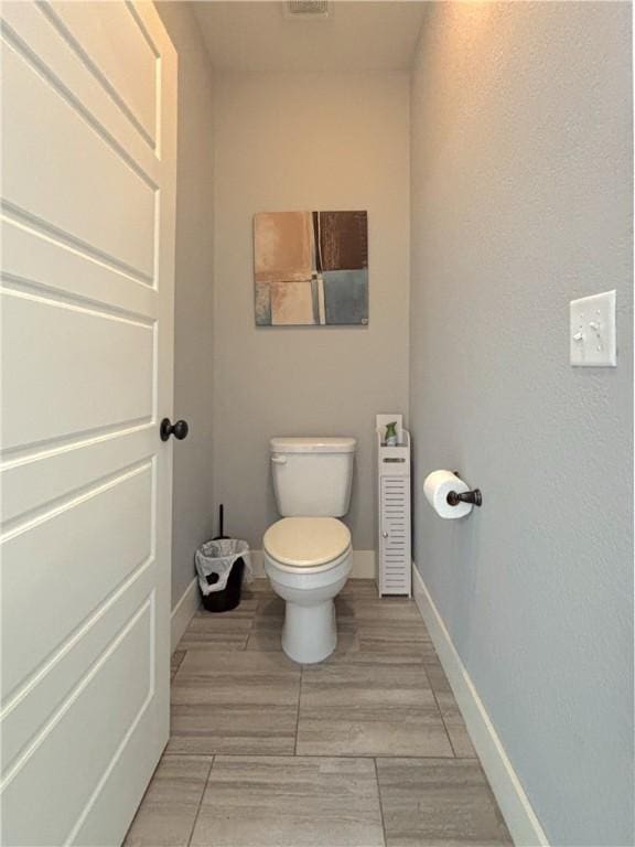 1610 Sweetbriar, Centerton, AR 72719 - bathroom with toilet and baseboards
