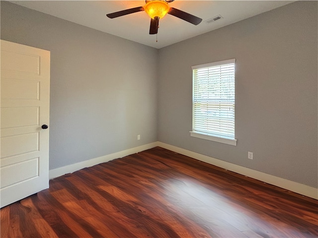 1610 Sweetbriar, Centerton, AR 72719 - unfurnished room featuring dark wood-style floors and ceiling fan