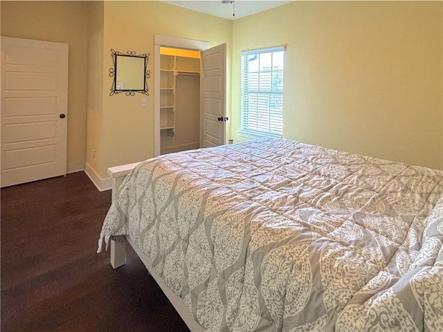 1610 Sweetbriar, Centerton, AR 72719 - bedroom with baseboards and dark carpet