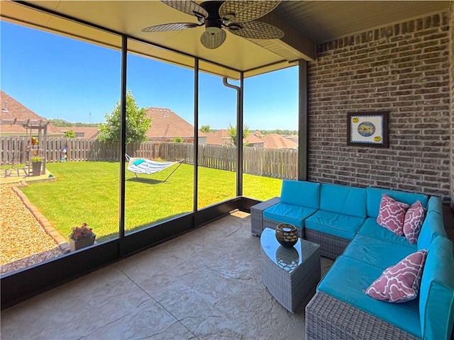 1610 Sweetbriar, Centerton, AR 72719 - sunroom featuring ceiling fan and outdoor lounge area
