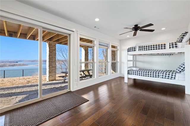 40 Rivercliff Rd, Rogers, AR 72756 - unfurnished bedroom featuring a water view, wood finished floors, access to exterior, recessed lighting, and ceiling fan