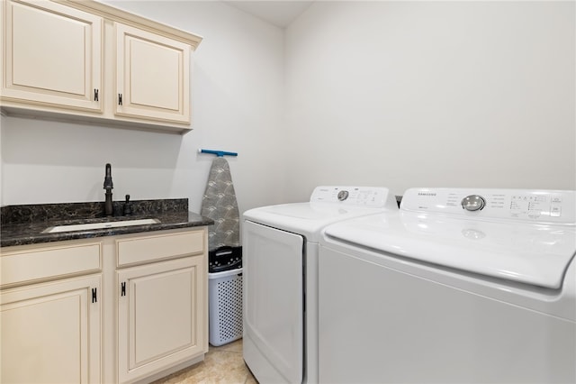 40 Rivercliff Rd, Rogers, AR 72756 - washroom with washer and dryer, cabinet space, and light tile patterned flooring
