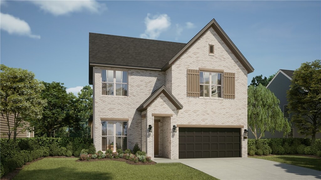 3003 S 14th St, Rogers, AR 72758 - view of front of house with an attached garage, driveway, brick siding, and a front lawn