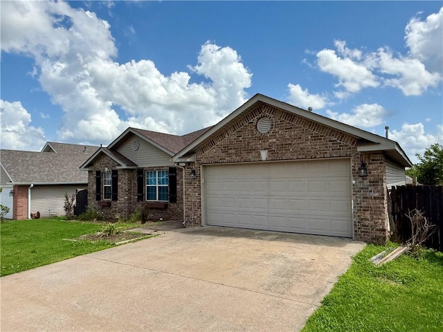 1204 Jim Mcvay, Siloam Springs, AR 72761 - ranch-style home featuring brick siding, a garage, and concrete driveway