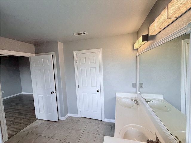 1204 Jim Mcvay, Siloam Springs, AR 72761 - bathroom with tile patterned flooring and double vanity