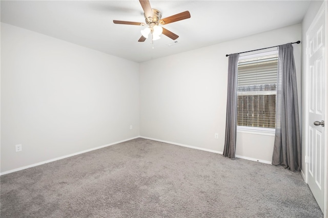 927 E Swift Dr, Fayetteville, AR 72701 - carpeted empty room featuring ceiling fan and baseboards