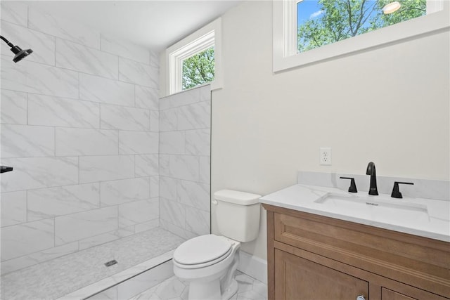 506 E Ashley St, Siloam Springs, AR 72761 - full bath with vanity, marble look tiles, and a tile shower