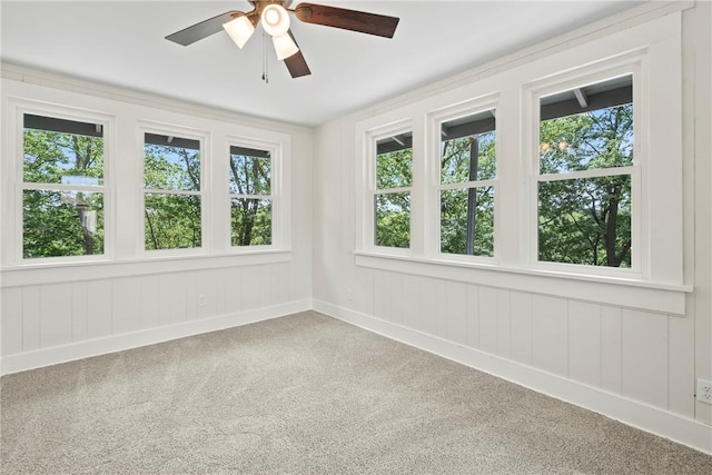 506 E Ashley St, Siloam Springs, AR 72761 - carpeted spare room featuring ceiling fan and plenty of natural light