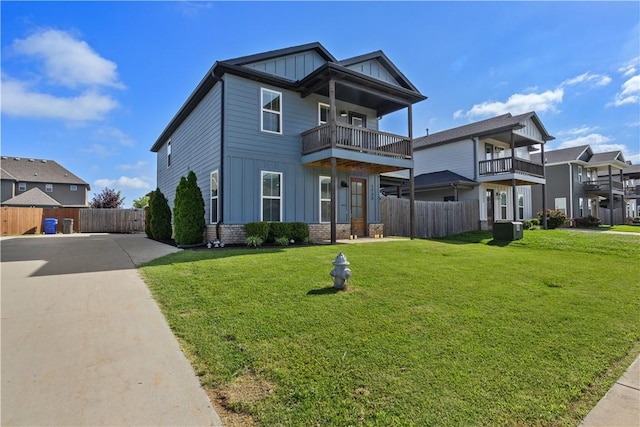 1735 W Whitney Ln, Rogers, AR 72758 - view of front facade featuring board and batten siding, a balcony, and concrete driveway