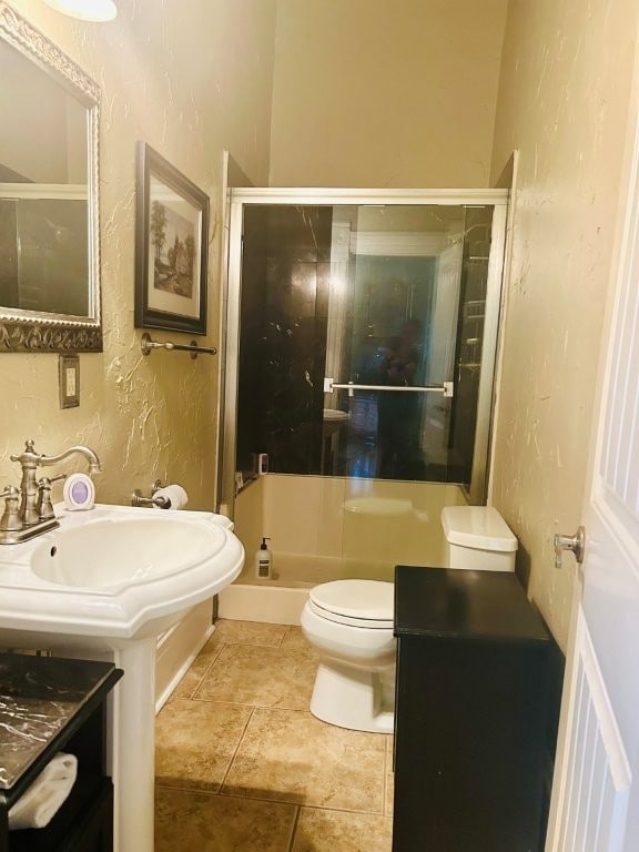 1016 S 4th St, Rogers, AR 72756 - bathroom with a textured wall and a stall shower