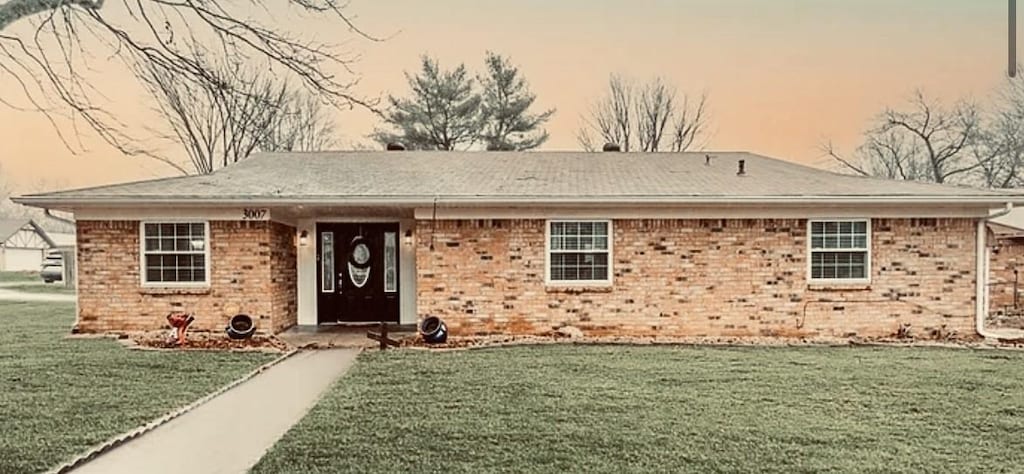 3007 W Beechwood Dr, Rogers, AR 72756 - ranch-style home featuring a front lawn and brick siding