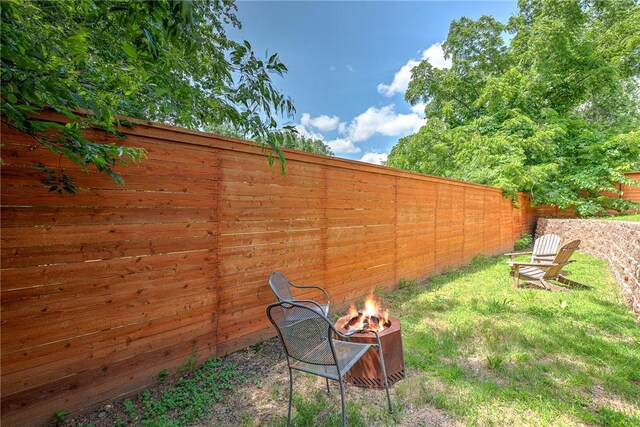 118 Briartown, Bentonville, AR 72712 - fenced backyard with an outdoor fire pit
