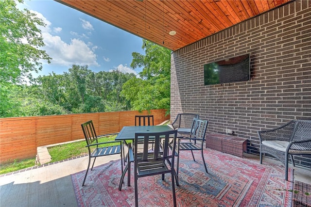 118 Briartown, Bentonville, AR 72712 - fenced backyard featuring outdoor dining space and a patio area