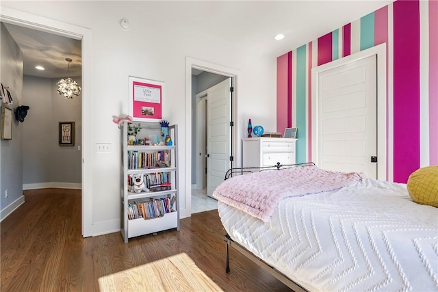 406 SW E St, Bentonville, AR 72712 - bedroom featuring wood finished floors and recessed lighting