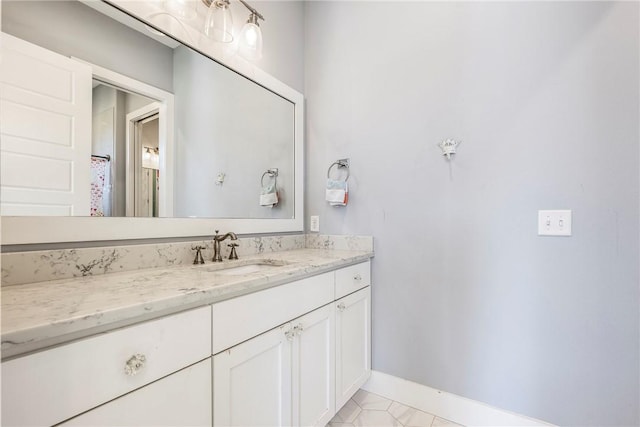 406 SW E St, Bentonville, AR 72712 - full bath with vanity and baseboards