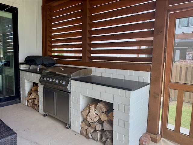 406 SW E St, Bentonville, AR 72712 - view of patio featuring grilling area