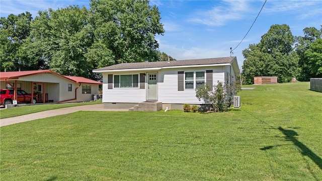 142 N Maple St, Cave Springs, AR 72718 - view of front of house with crawl space, a front yard, and concrete driveway