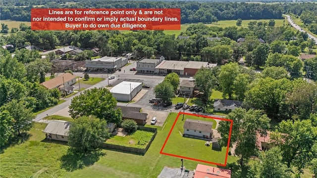142 N Maple St, Cave Springs, AR 72718 - aerial view of property and surrounding area featuring property parcel outlined