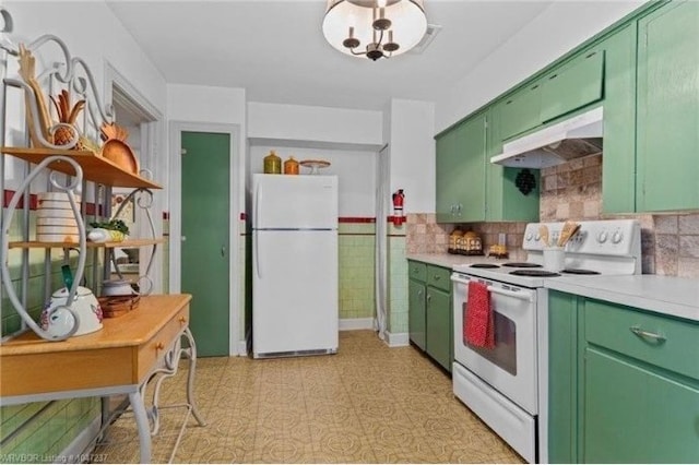 1107 S 20th St, Fort Smith, AR 72901 - kitchen featuring white appliances, green cabinets, under cabinet range hood, and light countertops