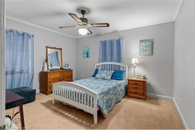 1107 S 20th St, Fort Smith, AR 72901 - carpeted bedroom with ornamental molding and a ceiling fan