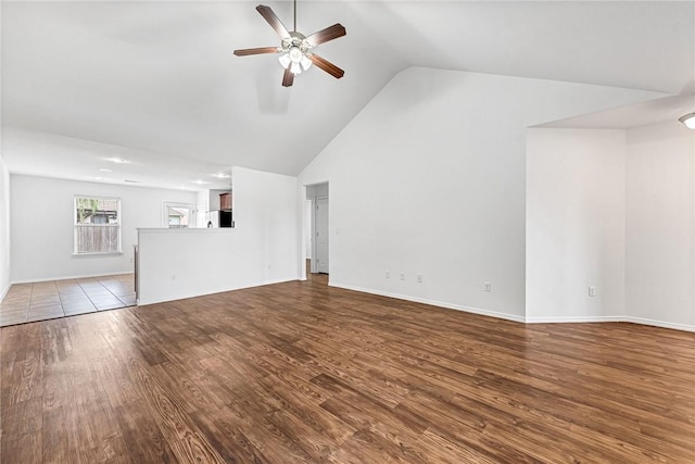 640 Spur Ln, Centerton, AR 72719 - unfurnished living room with a ceiling fan, wood finished floors, and high vaulted ceiling