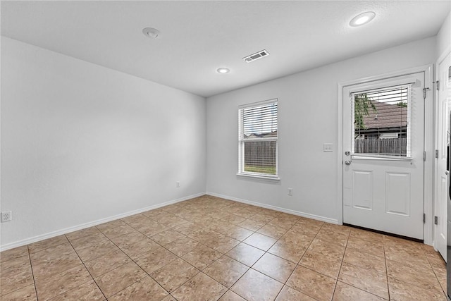 640 Spur Ln, Centerton, AR 72719 - entryway with plenty of natural light, recessed lighting, and light tile patterned floors