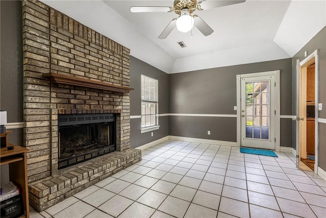 3310 Colton Dr, Springdale, AR 72762 - unfurnished living room featuring vaulted ceiling, tile patterned floors, a brick fireplace, and ceiling fan