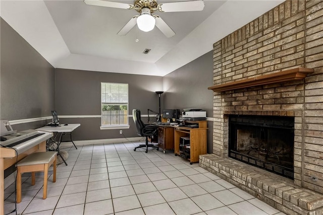 3310 Colton Dr, Springdale, AR 72762 - home office featuring light tile patterned flooring, a fireplace, a ceiling fan, and a tray ceiling