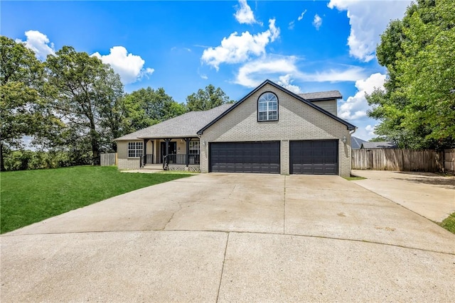 3310 Colton Dr, Springdale, AR 72762 - view of front facade with driveway, brick siding, and an attached garage