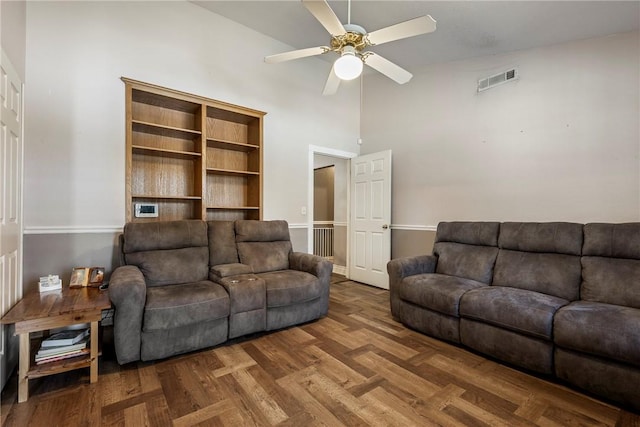 3310 Colton Dr, Springdale, AR 72762 - living area featuring high vaulted ceiling, ceiling fan, and wood finished floors