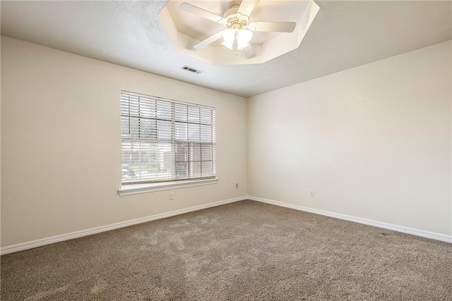 3310 Colton Dr, Springdale, AR 72762 - spare room with carpet floors, ceiling fan, and a tray ceiling