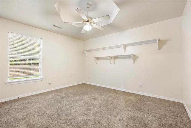 3310 Colton Dr, Springdale, AR 72762 - spare room featuring carpet and a ceiling fan