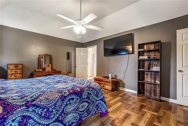 3310 Colton Dr, Springdale, AR 72762 - bedroom with a textured wall, vaulted ceiling, ceiling fan, and parquet floors
