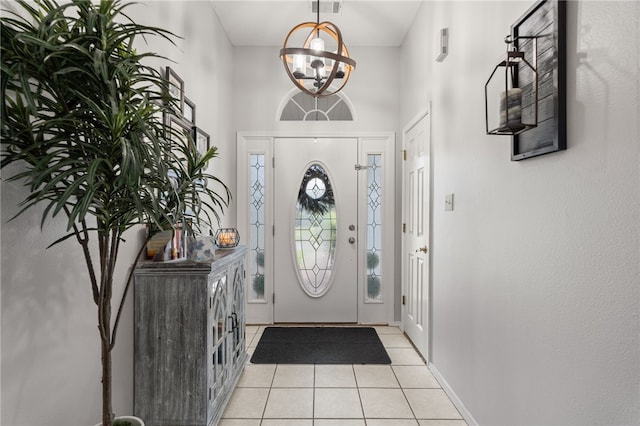146 Horizon Ln, Alma, AR 72921 - foyer featuring light tile patterned floors, a chandelier, and a high ceiling
