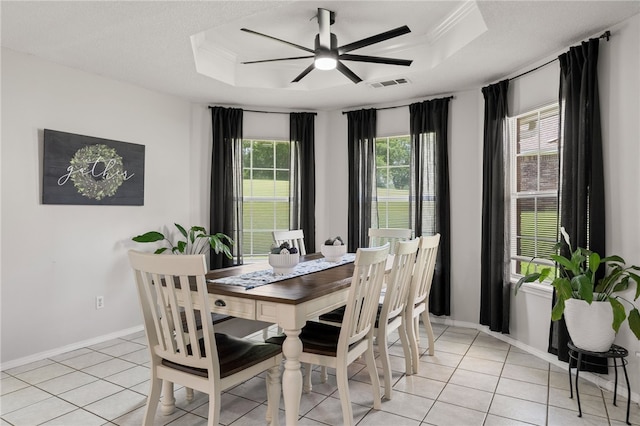 146 Horizon Ln, Alma, AR 72921 - dining room with a raised ceiling, light tile patterned flooring, ceiling fan, and crown molding