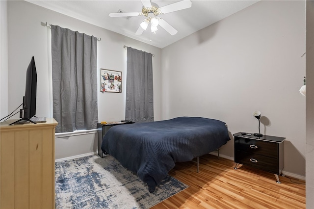 146 Horizon Ln, Alma, AR 72921 - bedroom with wood finished floors and a ceiling fan