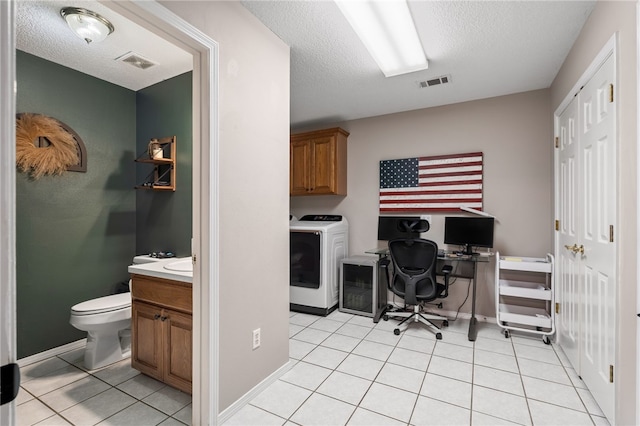 146 Horizon Ln, Alma, AR 72921 - office space featuring washer / clothes dryer, light tile patterned floors, and a textured ceiling